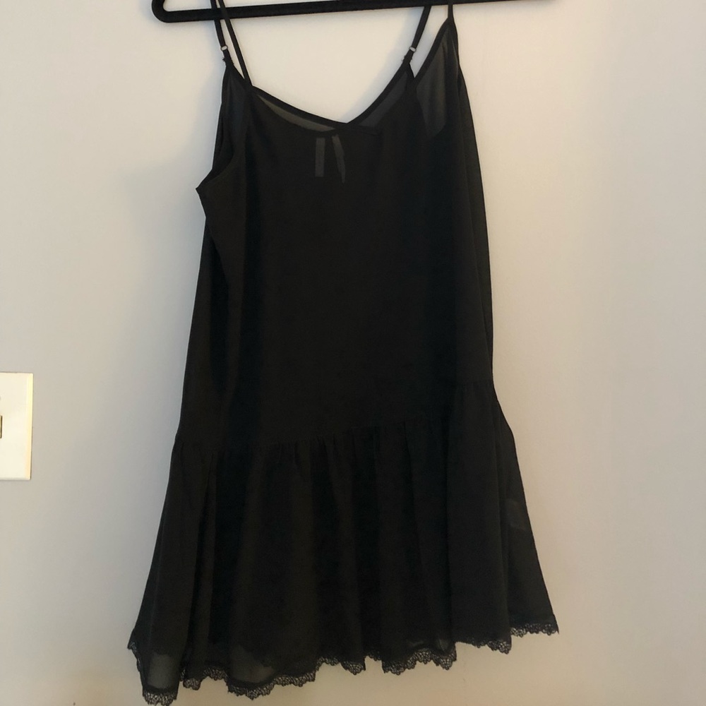 Frenchi peplum black tank with lace